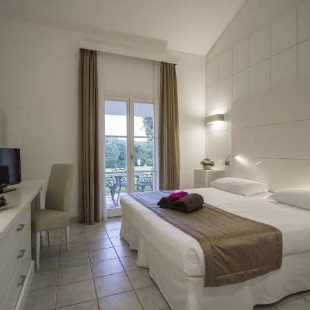 Veraclub Costa Rey Wellness & SPA - Sadegna Una camera del Veraclub Costa Rey Wellness & SPA - Sadegna